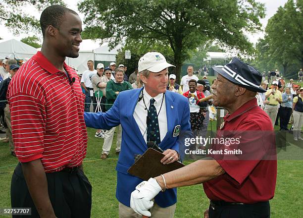 Emeka Okafor of the Charlotte Bobcats and 2005 NBA Rookie of the Year, meets Charlie Sifford , World Golf Hall of Fame member and the first African...