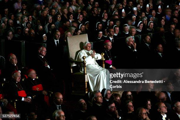 Pope Benedict XVI watches the movie "Karol, un uomo divenuto papa" , in memory of the late Pope, John Paul II, in the Paul VI Hall at the Vatican.