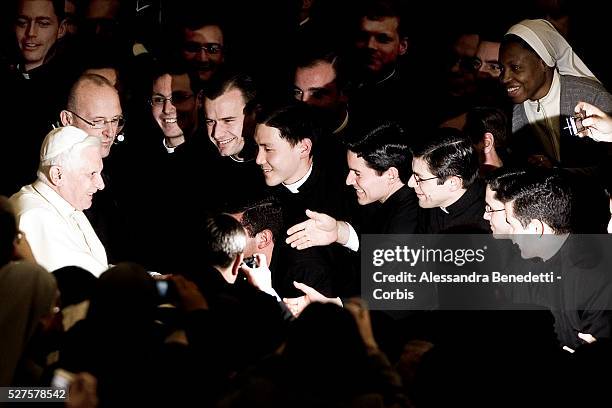 Flashes enlights Pope Benedict XVI upon his arrival at the Nervi Hall to attend a concert conducted by Proinnsias O' Duinn and performed by RTE'...