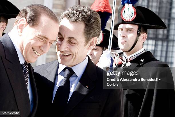 Italian Prime Minister Silvio Berlusconi and French President Nicolas Sarkozy arrive at Villa Madama for a bilateral meeting between France and Italy.