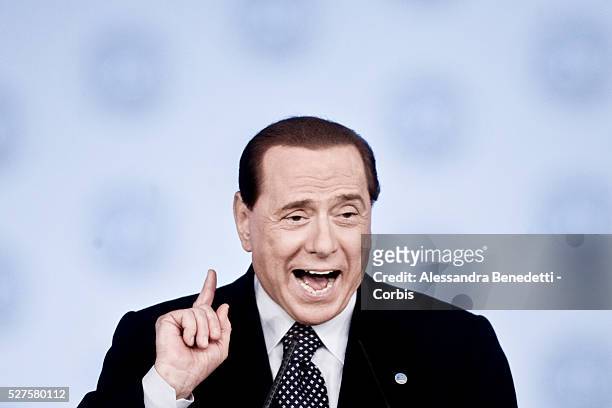 Italy's Prime Minister Silvio Berlusconi gives a his speech during the inaugural day of the first National Congress of centre-right Party "Popolo...