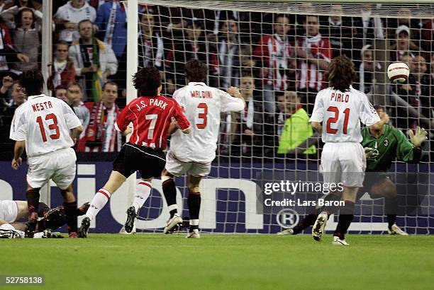 Ji Sung Park of Eindhoven scores the first goal during the champions league semi final second Leg match between PSV Eindhoven and AC Milan at the...