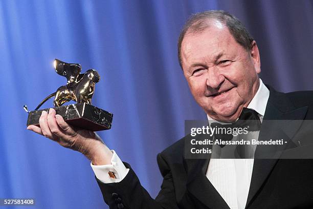 Roy Andersson receives the golden Lion for best movie A Pigeon Sat on a branch reflecting on existence.