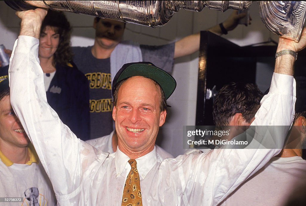 Craig Patrick Holds Up Stanley Cup