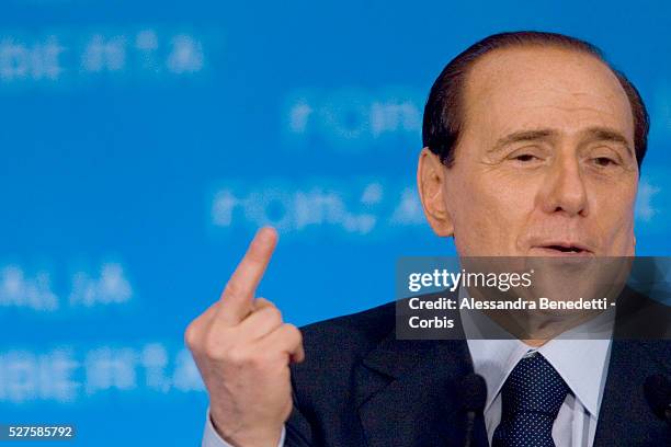 Italian Prime Minister Silvio Berlusconi gesturing during his first electoral speech before the official opening of the Italian electoral campaign at...