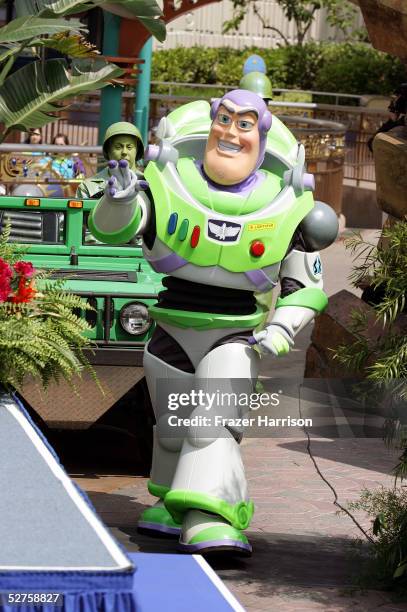 Buzz Lightyear attends the official opening of the new Tomorrowland attraction "Buzz Lightyear Astro Blasters" during the Disneyland 50th Anniversary...