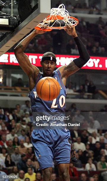 Larry Hughes of the Washington Wizards dunks the ball against the Chicago Bulls in Game five of the Eastern Conference Quarterfinals during the 2005...