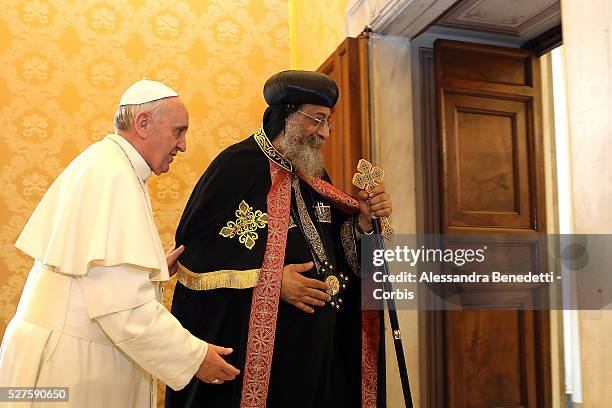 Coptic Orthodox Pope Tawadros II of Alexandria Egypt exchanges gifts with Pope Francis at his private library on May 10, 2013 in Vatican City,...