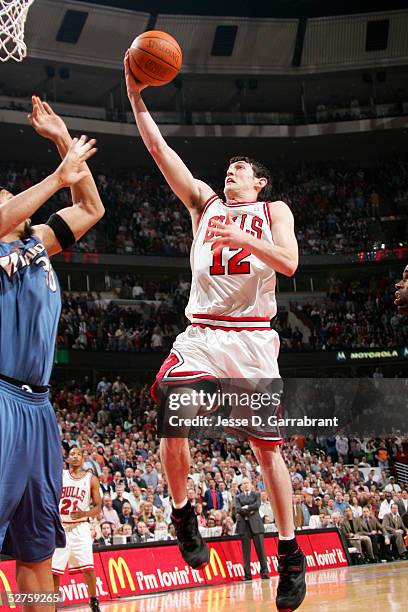 Kirk Hinrich of the Chicago Bulls drives against the Washington Wizards in Game five of the Eastern Conference Quarterfinals during the 2005 NBA...