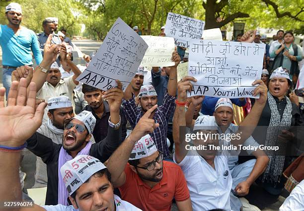 Youth wing Members protesting against Modi Government and Congress on Agustawestland issue in New Delhi.