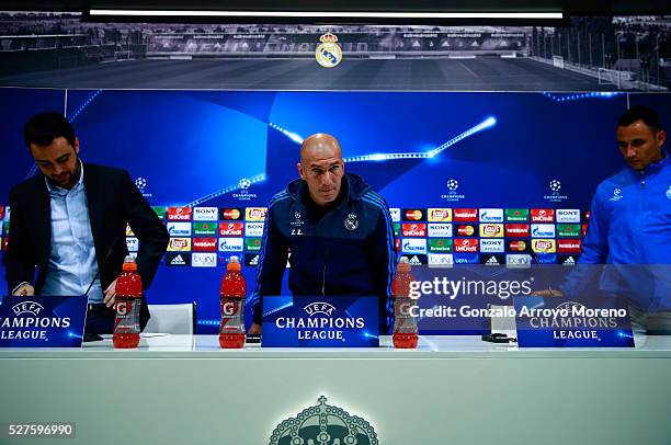 Zinedine Zidane, Manager of Real Madrid takes his seat during a press conference ahead of the UEFA Champions League Semi Final Second Leg between...