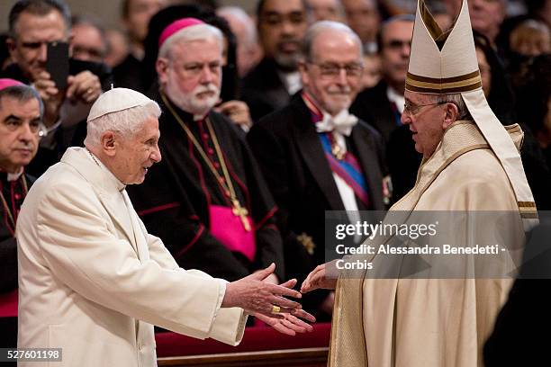 Pope Emeritus Benedict XVI is greeted by Pope Francis at the end of Consistory ceremony. Pope Francis appointed 20 new cardinals today during a...