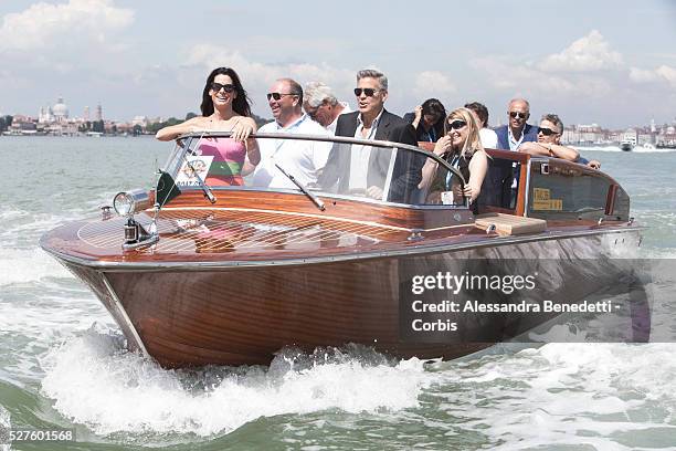 Sandra Bullock and George Clooney on their way to the Venice Lido, by boat, to promote the movie Gravity presented out of competition at the 70th...