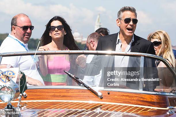 Sandra Bullock and George Clooney on their way to the Venice Lido, by boat, to promote the movie Gravity presented out of competition at the 70th...