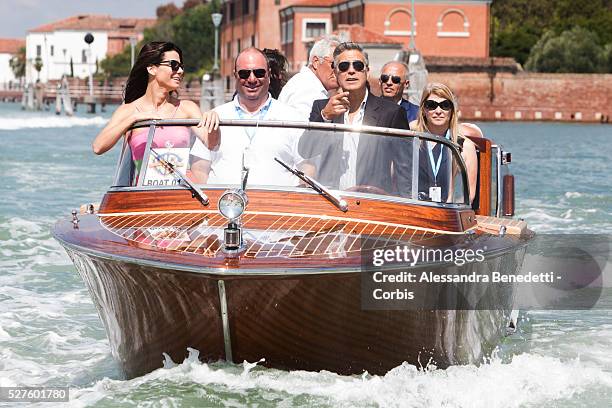 Sandra Bullock and George Clooney on their way to the Venice Lido, by boat, to promote the movie Gravity presented out of competition at the 70th...