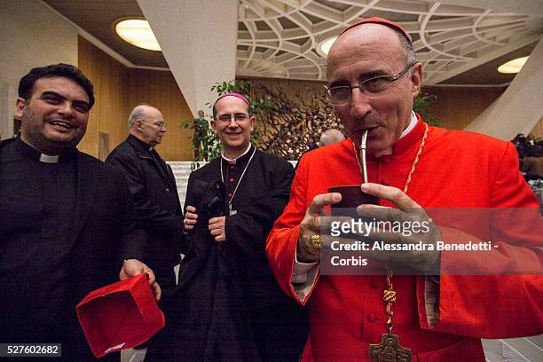 Newly appointed Cardinal Daniel Fernando Sturla Berrhouet , is greeted by faithfuls and Vatican Curia members in the Apostolic Palace at Vatican....