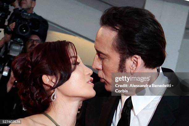 Nicolas Cage and wife Alice Kim kiss each other during the premiere of movie Joe, presnted in competition during the 70th International Venice film...