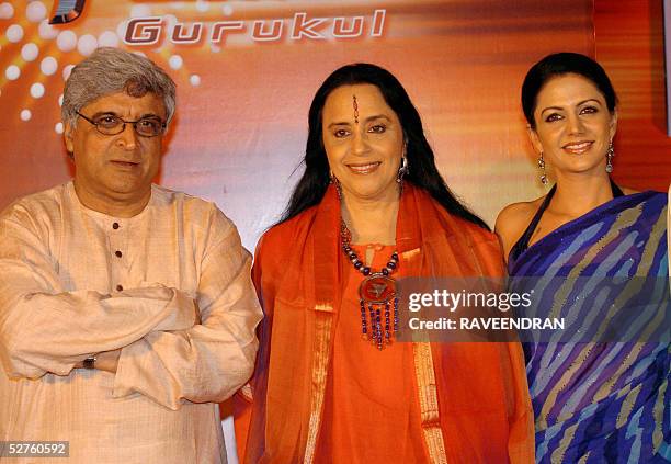 Indian film lyricist, screenplay writer and poet Javed Akhtar singer Ila Arun and actress Mandira Bedi pose for photographers at the launch of Sony...