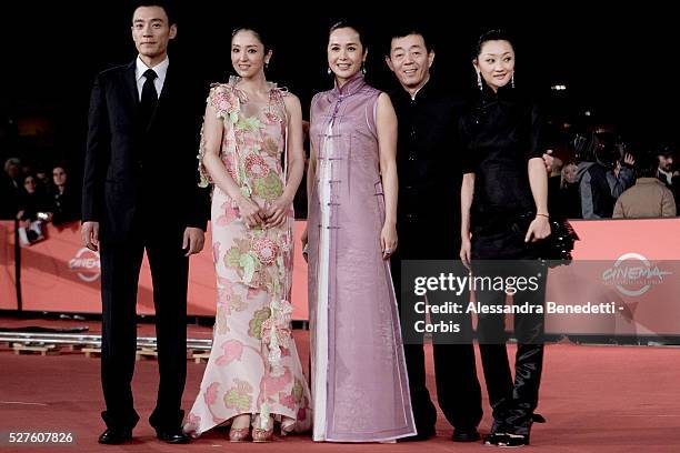 Chinese director Chang Wei Gu poses with compatriots and actors Li Guangjie, Dong Xuan, Jiang Wenli, and Zhang Yao attend the premiere of "And The...