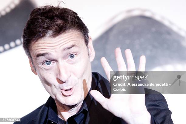 Member of the official Jury director P.J. Hogan poses during the photocall of the jury on November 9, 2012 on the opening day of the Rome's film...