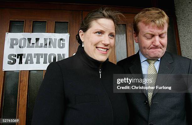 Liberal Democrat leader Charles Kennedy and his wife Sarah leave after casting their vote at Caol Community Centre on May 5, 2005 in Fort William,...