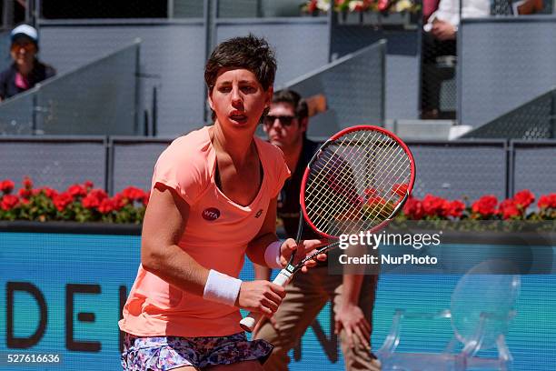 Carla Suarez of Spain in action Sabine Lisicki of Germany their match during day fourth of the Mutua Madrid Open tennis tournament at the Caja Magica...