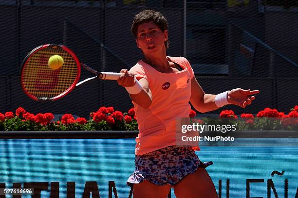 Carla Suarez of Spain in action Sabine Lisicki of Germany their match during day fourth of the Mutua Madrid Open tennis tournament at the Caja Magica...