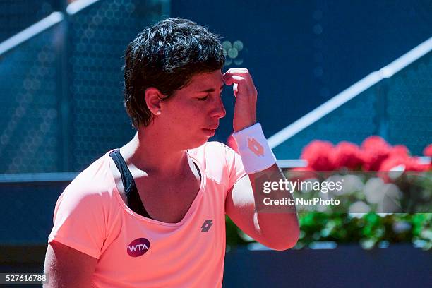 Carla Suarez of Spain in action Sabine Lisicki of Germany their match during day fourth of the Mutua Madrid Open tennis tournament at the Caja Magica...