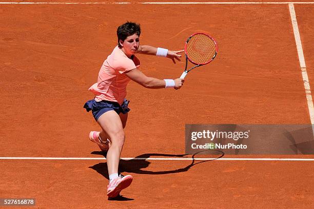 Carla Suarez of Spain in action Sabine Lisicki of Germany their match during day fourth of the Mutua Madrid Open tennis tournament at the Caja Magica...