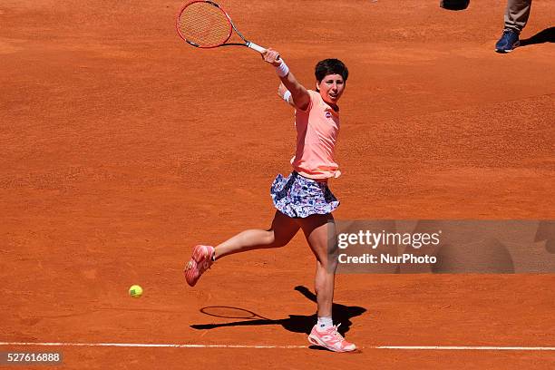 Carla Suarez of Spain in action Sabine Lisicki of Germany their match during day fourth of the Mutua Madrid Open tennis tournament at the Caja Magica...