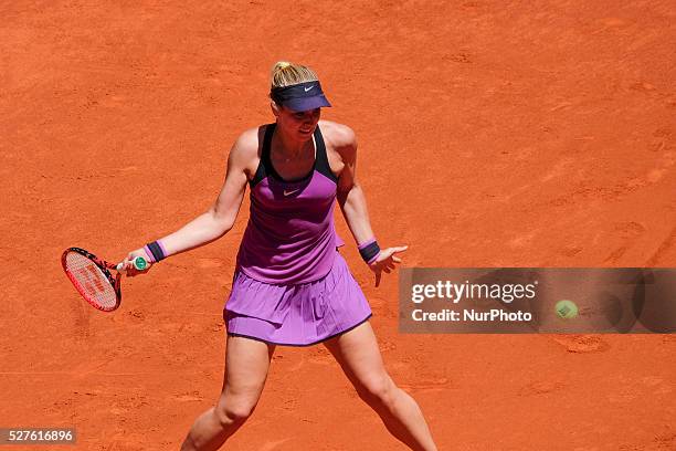 Sabine Lisicki of Germany in action Carla Suarez of Spain their match during day fourth of the Mutua Madrid Open tennis tournament at the Caja Magica...