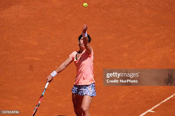 Carla Suarez of Spain in action Sabine Lisicki of Germany their match during day fourth of the Mutua Madrid Open tennis tournament at the Caja Magica...