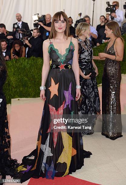 Dakota Johnson arrives for the "Manus x Machina: Fashion In An Age Of Technology" Costume Institute Gala at Metropolitan Museum of Art on May 2, 2016...