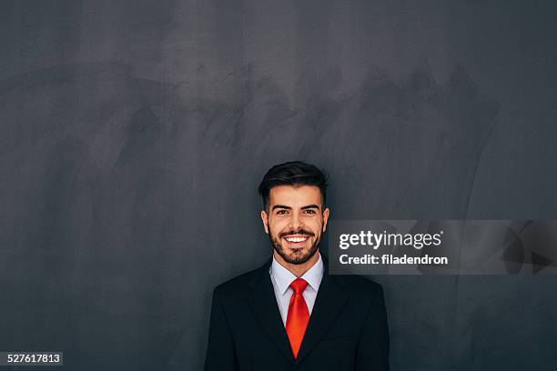 businessman front of blackboard - advisory board stockfoto's en -beelden