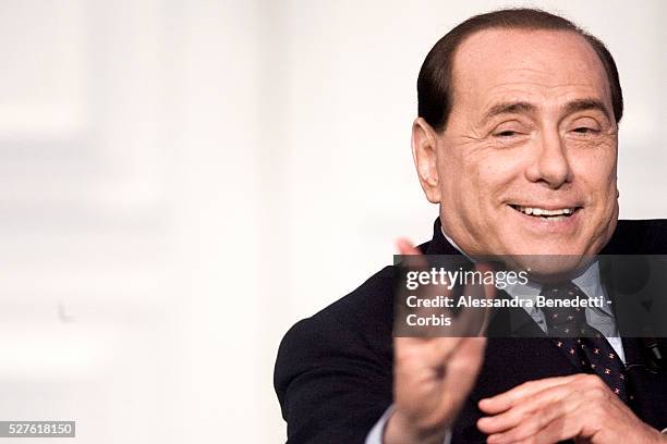 Silvio Berlusconi, leader of Italy's center-right coalition Forza Italia, attends the Italian political debate show Porta a Porta, at Rai's broadcast...