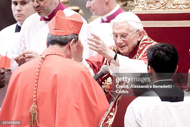 Colombia's cardinal Ruben Salazar Gomez receives the biretta cap from Pope Benedict XVI in Saint Peter's Basilica on November 24, 2012 in Vatican...