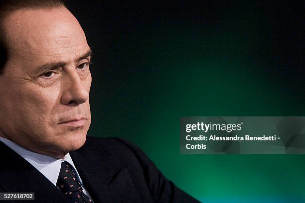 Silvio Berlusconi, leader of Italy's center-right coalition Forza Italia, attends the Italian political debate show Porta a Porta, at Rai's broadcast...