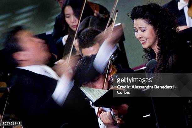 Chinese soprano Lan Rao performs during a special concert performed by the China Philharmonic Orchestra and directed by chinese director Long Yu in...