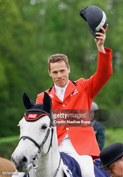 Christian Ahlmann of Germany on his horse Coester celebrates winning the Volkswagen Championat of Hamburg at he German Jumping and Dressage Grand...