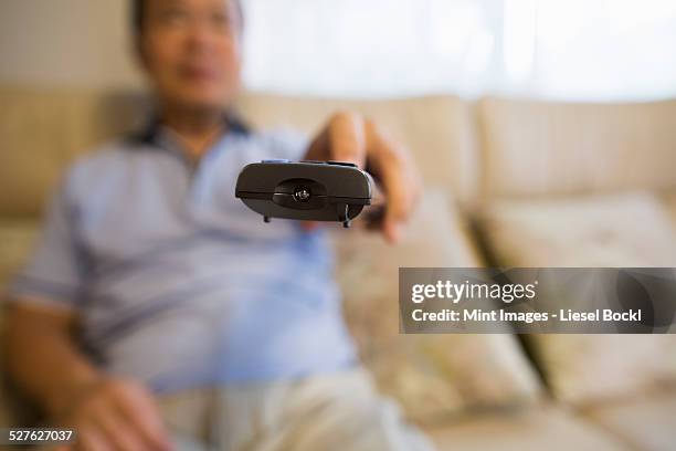 Man Remote Control 336 Man Pointing Remote Control Stock Photos, High-Res Pictures, and ...