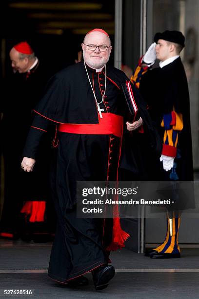 Cardinal Reinhard Marx arrives at a special consistory in the Synod hall at the Vatican on Feb. 13, 2015. Pope Francis met with cardinals and bishops...