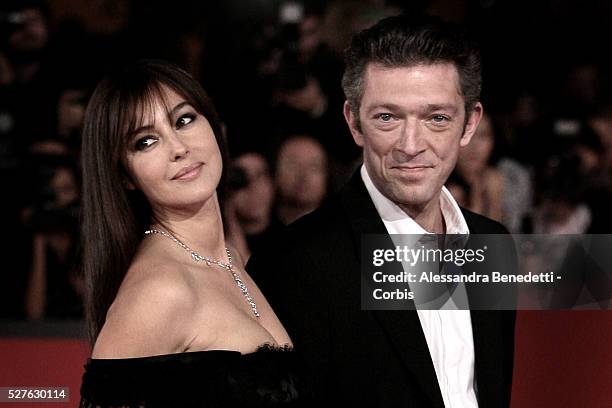 Italian actress Monica Bellucci and husband French actor Vincent Cassell arrive at Rome's Auditorium to attend the premiere of movie "L'UOMO CHE AMA"...