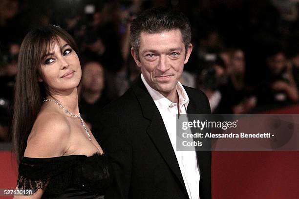 Italian actress Monica Bellucci and husband French actor Vincent Cassell arrive at Rome's Auditorium to attend the premiere of movie "L'UOMO CHE AMA"...