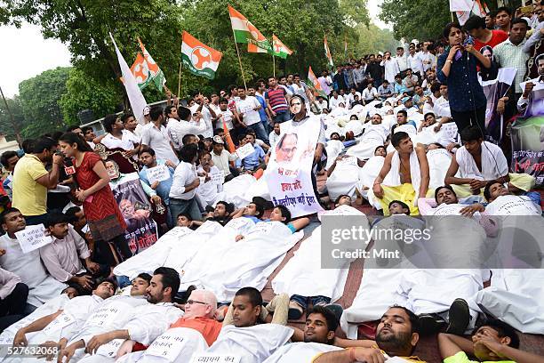 Indian Youth Congress workers stage a street play against various scams of the NDA government at Raisina Road on August 6, 2015 in New Delhi, India.