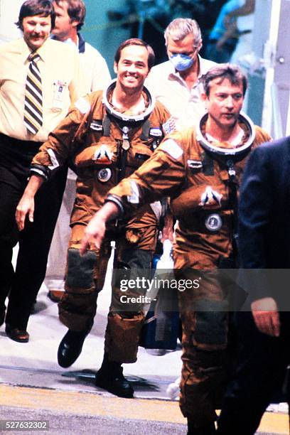 Astronauts Robert Crippen and John Young prepare to board the space shuttle Columbia before the first shuttle flight at Kennedy Space Center in...