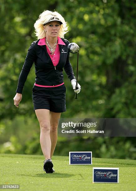 Danielle Amiee, winner of the Golf Channel's "Big Break III", walks off the tenth green during the first round of the Michelob Ultra Open at the...