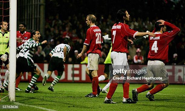Players look dejected as Sporting celebrate scoring the winning goal in injury time of extra time, during the UEFA Cup Semi Final, 2nd Leg, match...