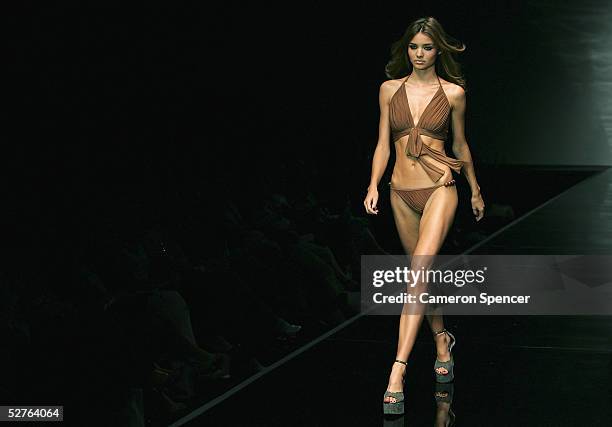 Model walks the runway at the Zimmermann collection presentation at the Overseas Passenger Terminal during the Mercedes Australian Fashion Week on...