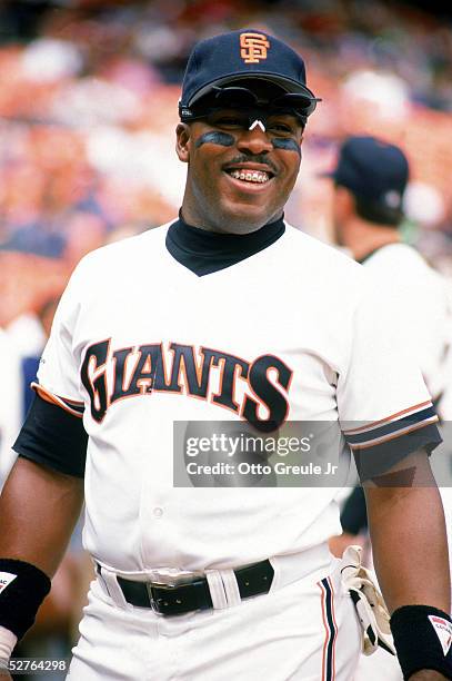Kevin Mitchell of the San Francisco Giants smiles during a 1991 game at Candlestick Park in San Francisco, California.