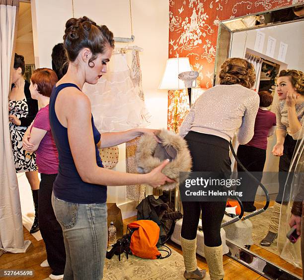 women in changing room prior to fashion show - woman backstage stock pictures, royalty-free photos & images